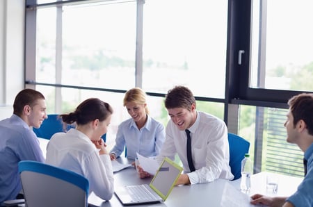 Group of happy young business people in a meeting at office-1